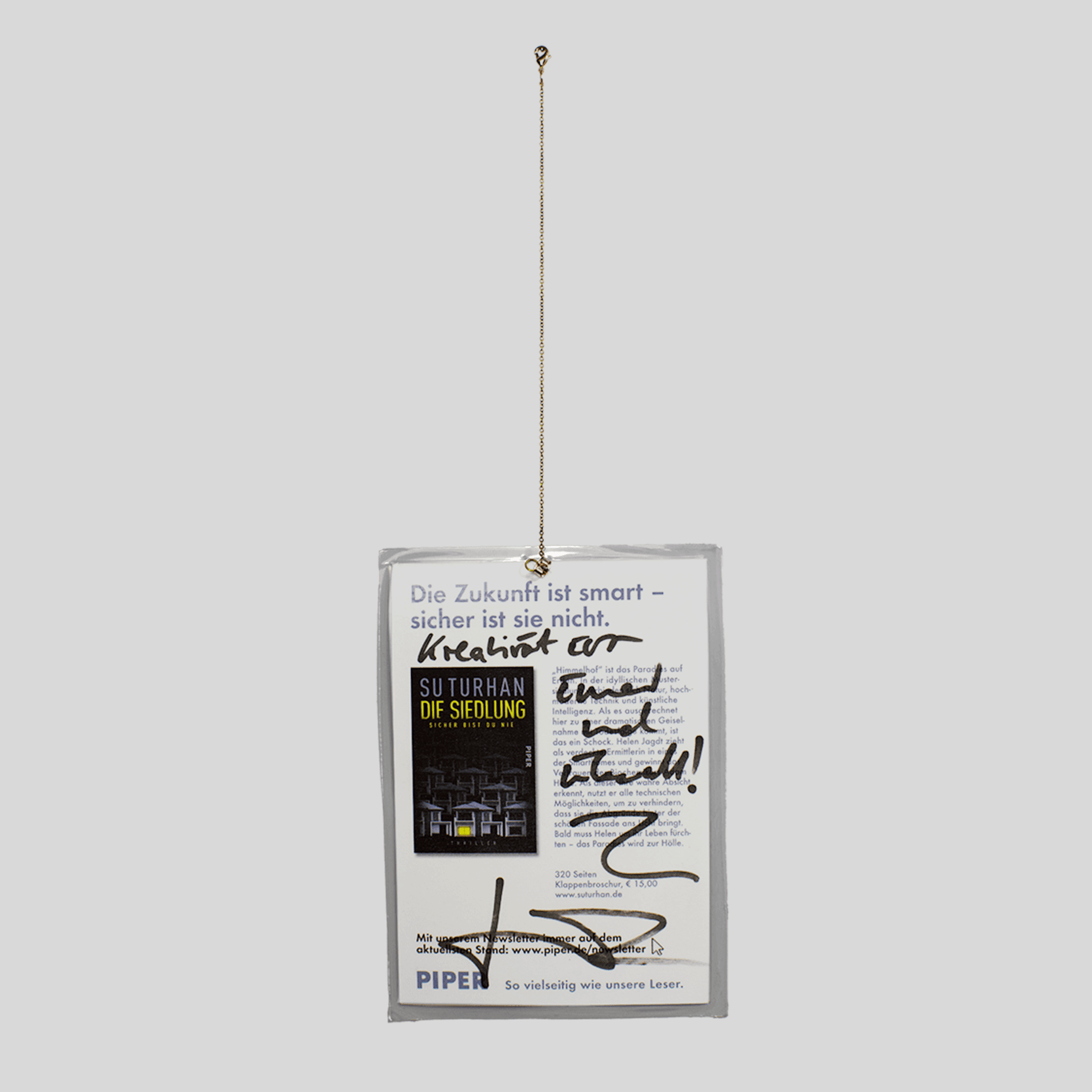 Feuerzeug und Postkarte